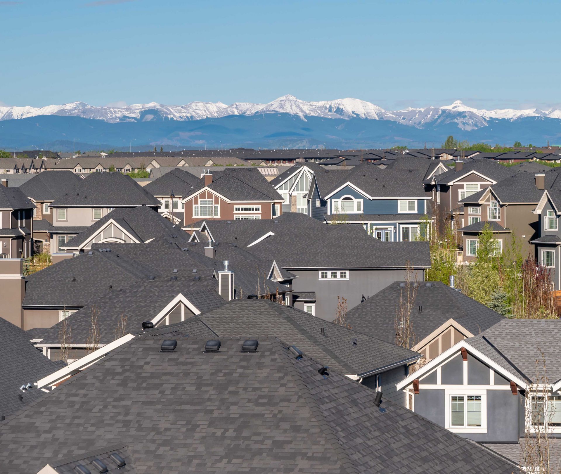 Home roofs mountains scaled