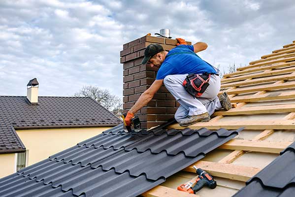 Worker Repairing Roof in Calgary